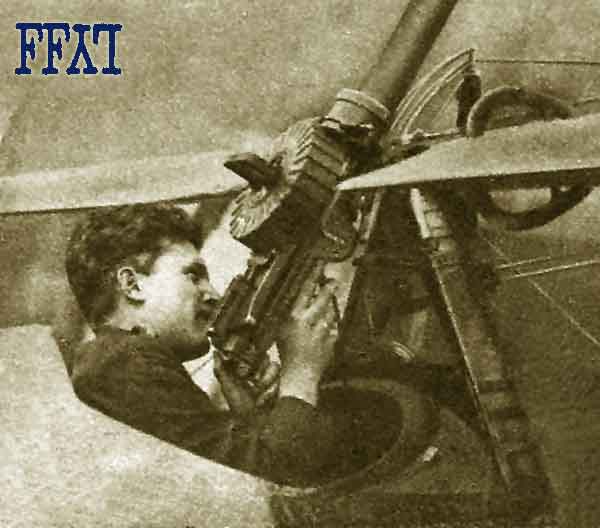 Billy Bishop inspects his guns
